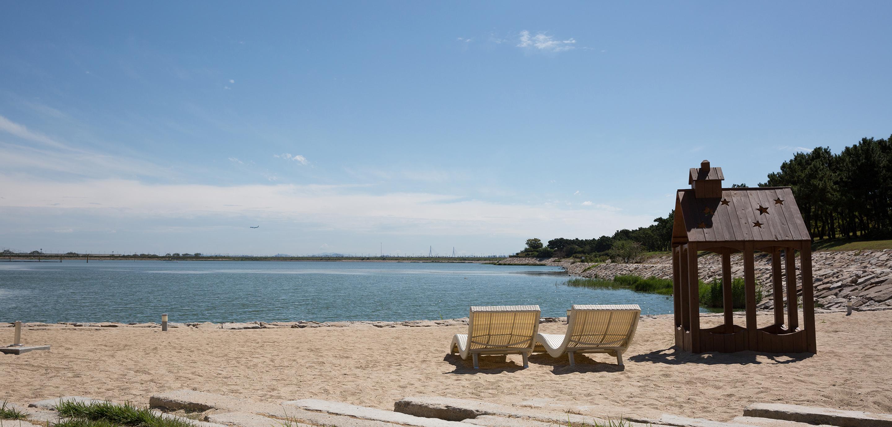 โรงแรมเนสต์ อินชอน ภายนอก รูปภาพ The beach at Lake Whitney