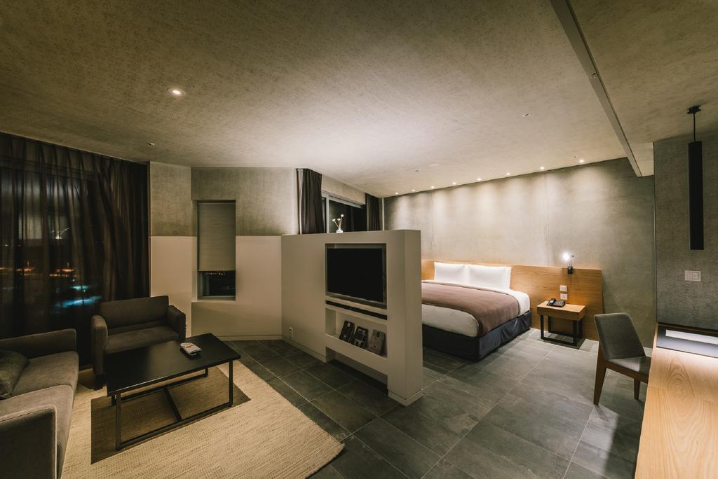 โรงแรมเนสต์ อินชอน ภายนอก รูปภาพ A room at the hotel